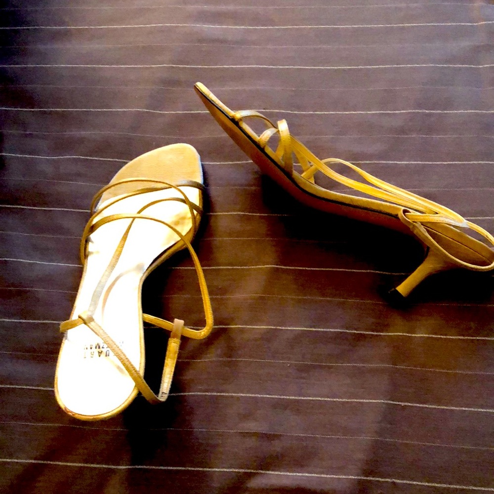 Gold size 8-1/2 heels, worn once.